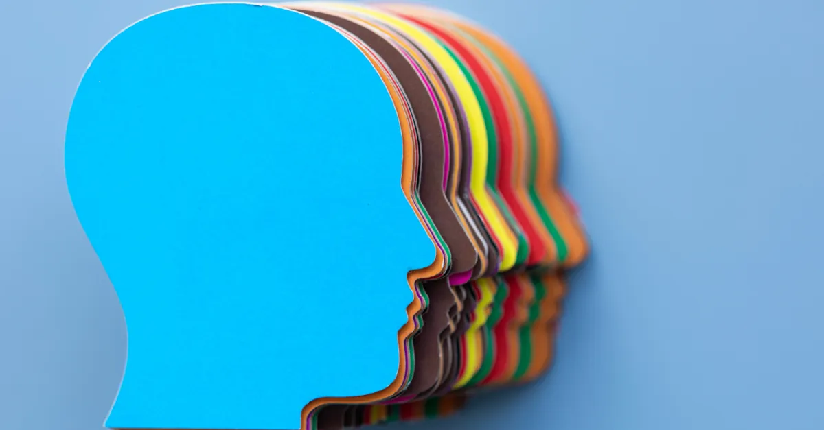 Row of colourful paper profile silhouettes representing multiple allied health disciplines