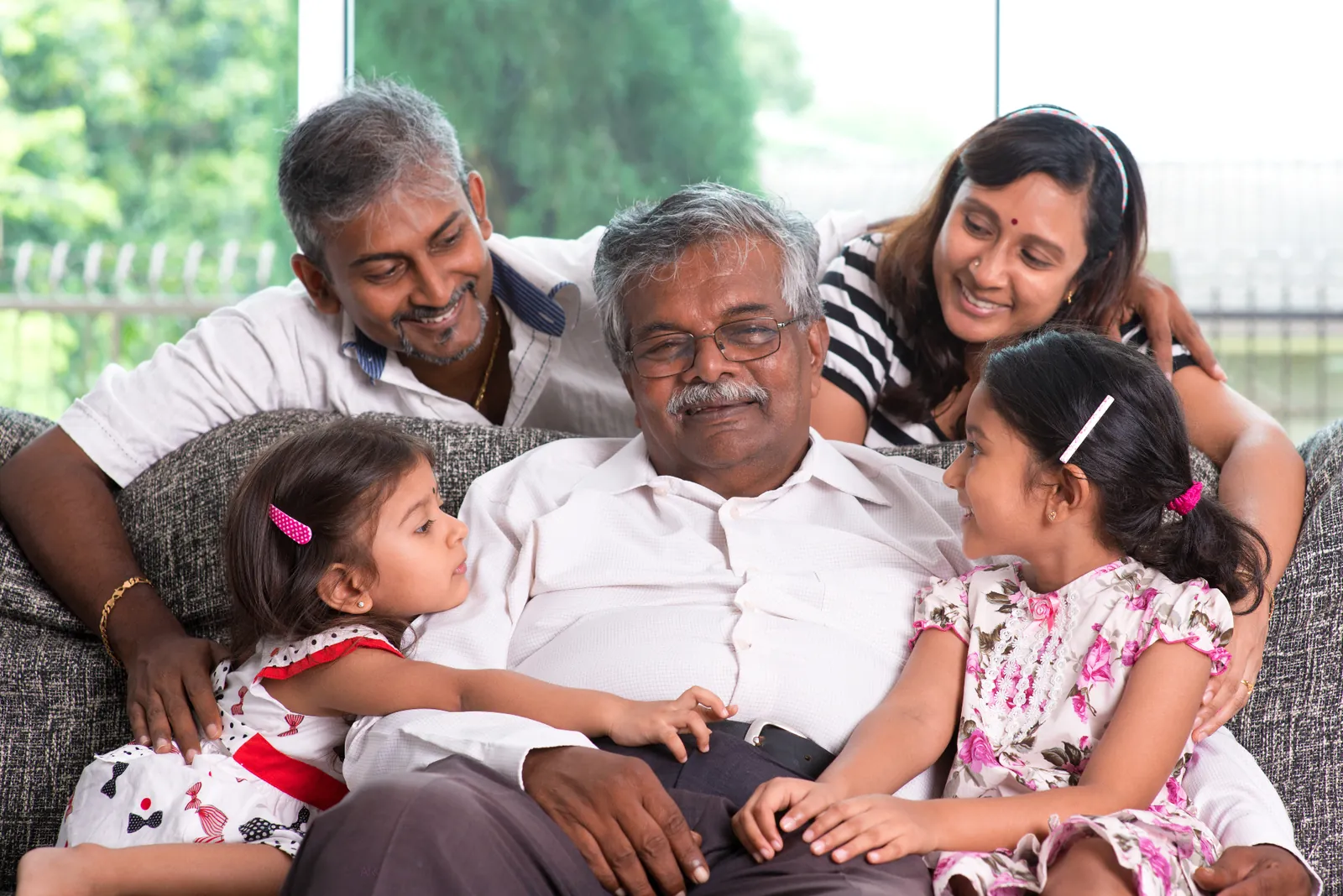 Family with an older parent across generations, illustrating aged care decisions